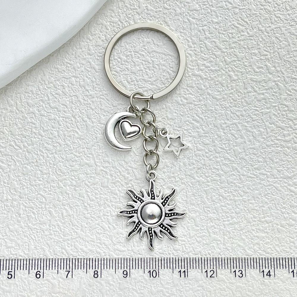 Silver Sun & Moon Stars Pendant Keychain: High-End Shoulder Bag Ornament