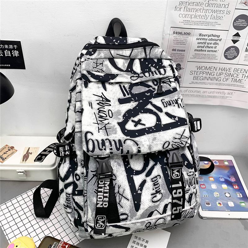 Autumn new fashion schoolbag female personality camouflage graffiti couple backpack large capacity student backpack male