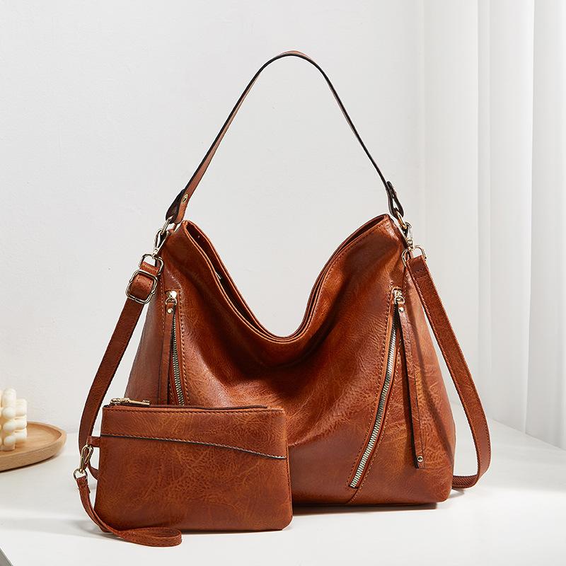 

Commuting to work Large capacity tote bag Fashion retro women s bag High sense child and mother bag One shoulder messenger bag