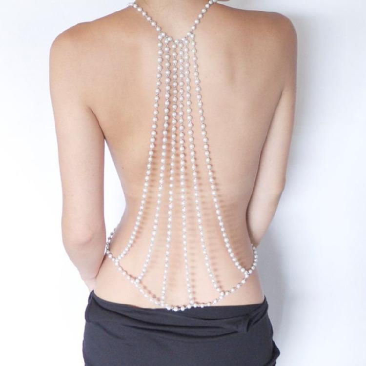 Alluring Pearls And Gold Alloy Body Chain Necklace Designed For Women Seeking To Stand Out At Social Gatherings