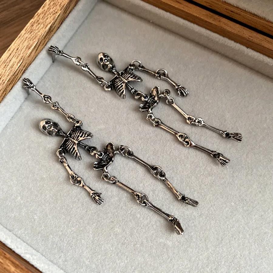

European and American silver needle skull fringed earrings personalized retro exaggerated temperament earrings light luxury high-end earrings women
