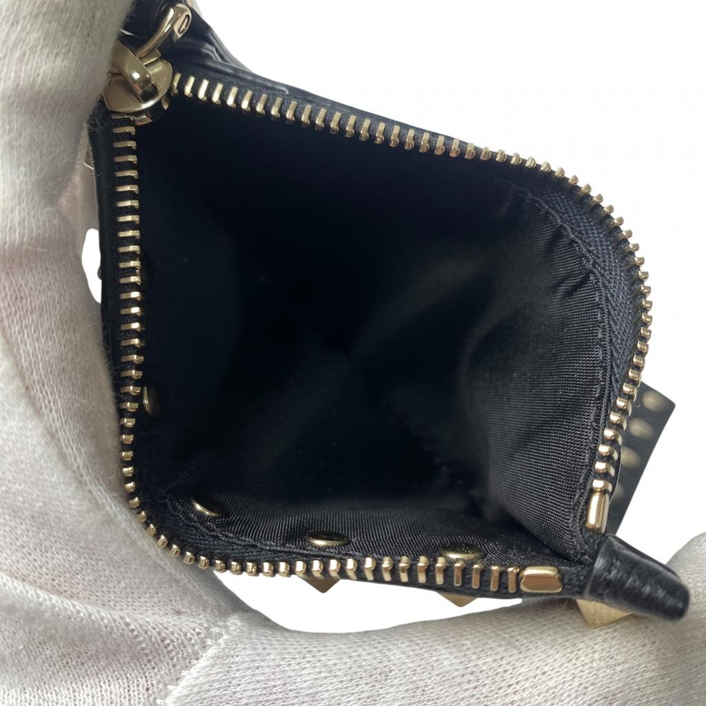 Carteira Bifold Valentino Garavani usada couro preto/dourado Mulher
