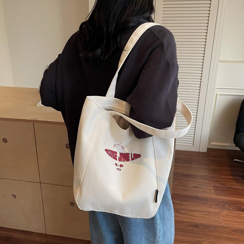 2026 Women's Large Capacity Canvas Tote Bag - Versatile Single Shoulder Bag for Autumn/Winter Commute and College.