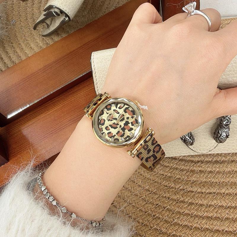 Neuankunft Runde Große Zifferblatt Leopardendruck Uhr Edelstahlarmband Gold High-End Damenuhr Mode Quarz Uhr