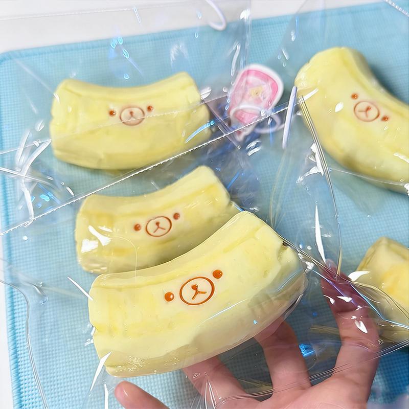 handmade Squishy with BUTTER texture - Banana bear Shaped Decor to Relieve Stress - Food grade silicone Safety Material S
