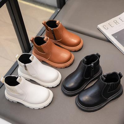 Dziecięce buty Martin 2025 jesień i zima nowe dziewczęce krótkie buty w stylu brytyjskim modne dziewczęce pojedyncze buty na miękkiej podeszwie chłopięce skórzane buty
