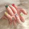 Champagne Pink Rhinestone Flower Nail Art Decorations: Sparkly, Colorful, Five-Petal Design with Pointed Back