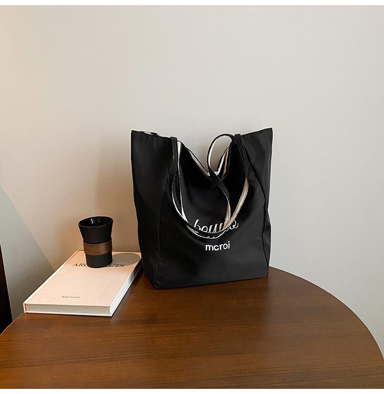 

Double-sided striped canvas bag female niche Korean large-capacity lazy wind tote bag student leisure shopping bag bag