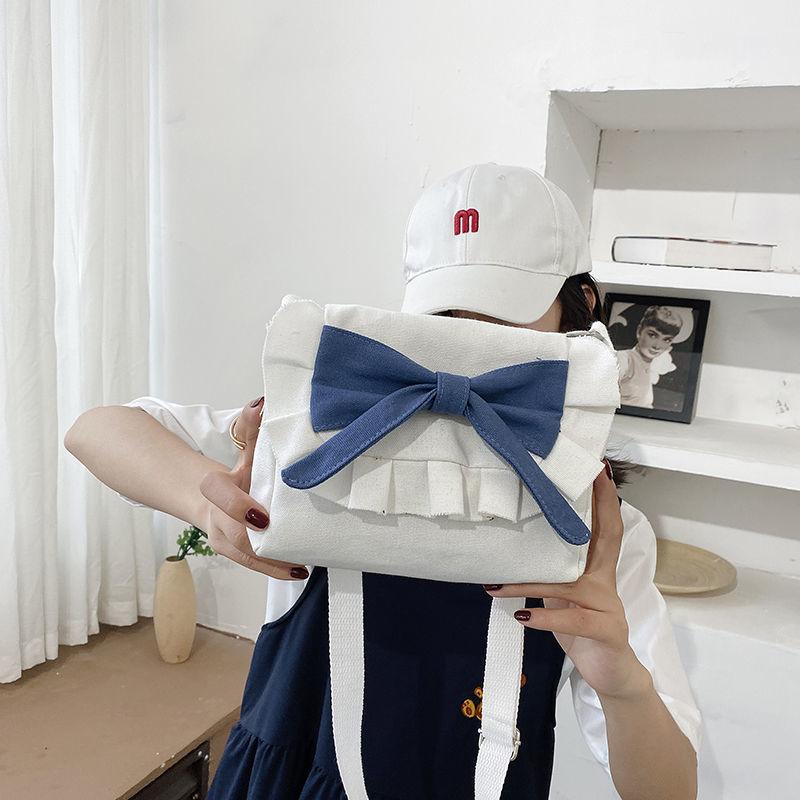 

Small bag women s 2020 new ins Japanese canvas messenger bag student versatile girl fresh cartoon messenger bag Blue without pendant