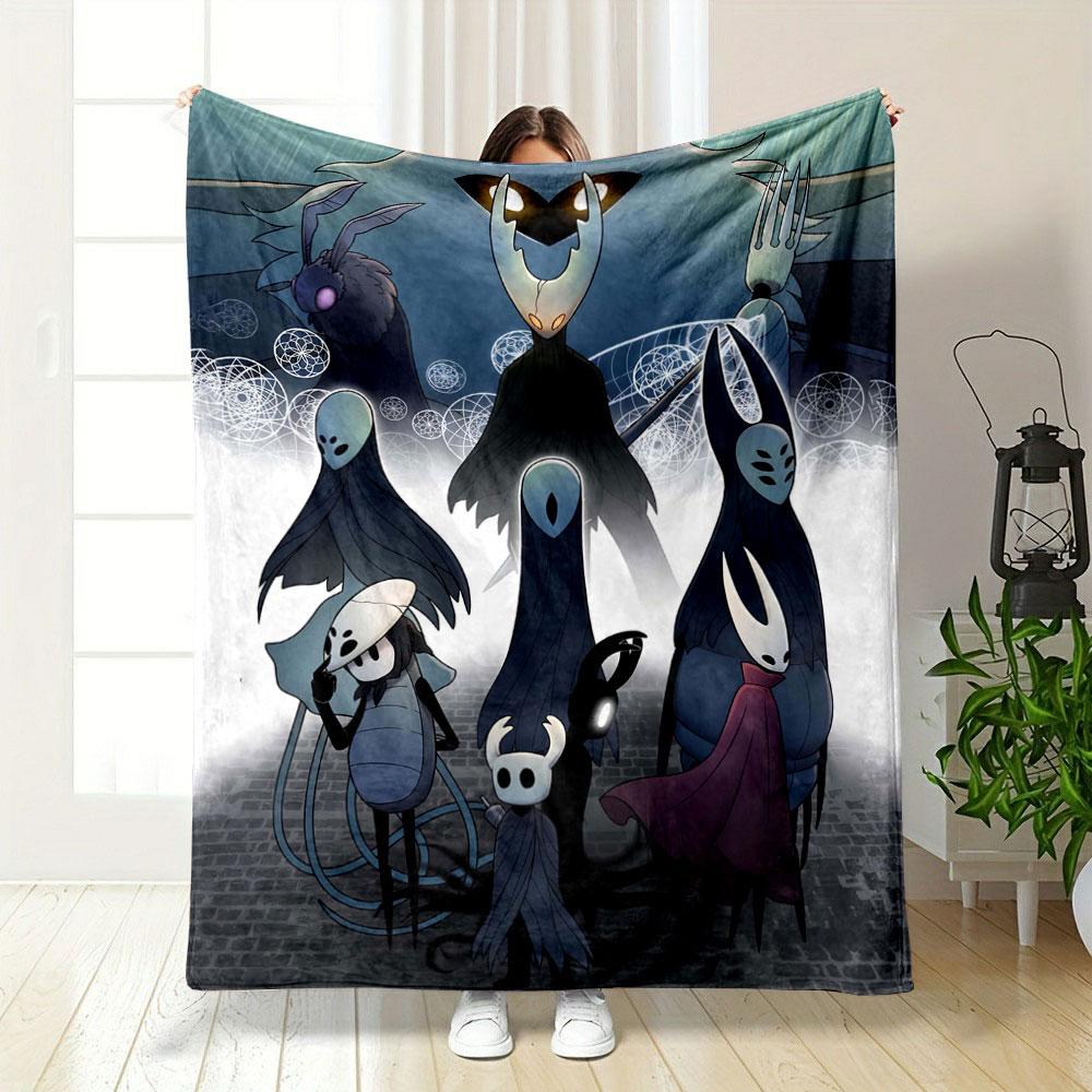 The pattern depicts dark, stylized insect-like characters in a mystical scene. for all seasons blanket lunch break throw gift