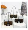 Niche leopard print underarm bag, fashionable retro high sense, commuting shoulder essential women's bag.