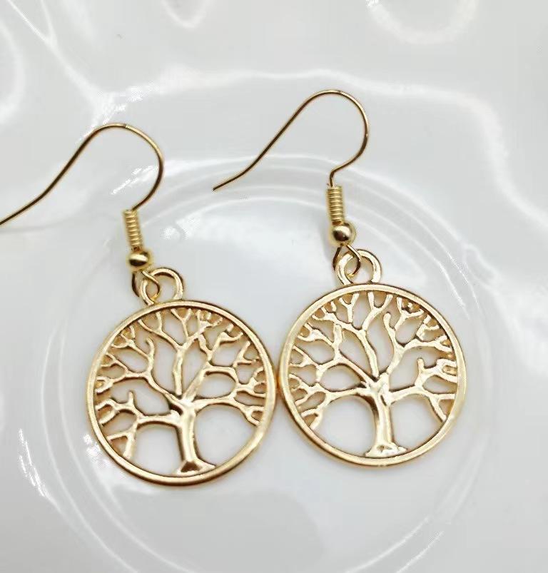 

Fashionable and minimalist hollowed out Tree of Life earrings, with hollowed out tree ear hooks suitable for women to wear