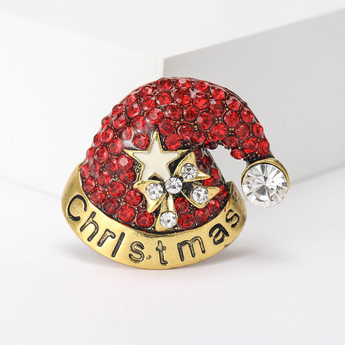 

Новый трансграничный хит продаж Санта-Клаус шляпа брошь сплав гальванизированный одежда аксессуары грудь цветок красный