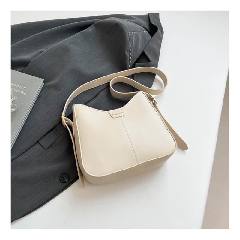 

Textured versatile bucket bag women s new trendy Korean version fashionable wide shoulder strap foreign style single shoulder oblique A