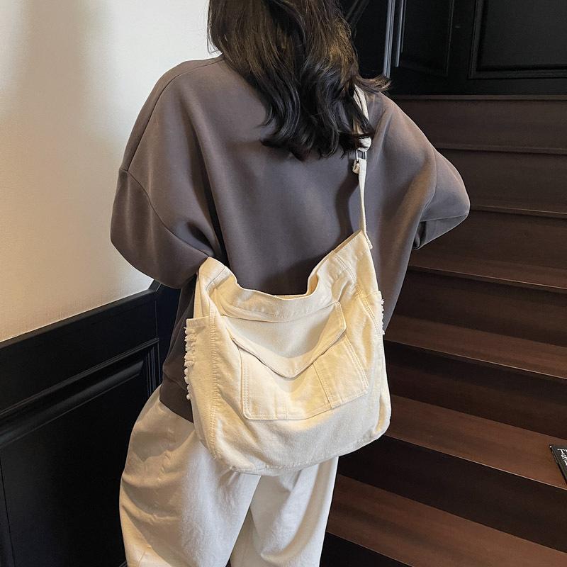 Fashion Texture Personalized Shoulder Bag Large Capacity Messenger Bag Commuter Student Tote Bag Simple Tutoring Bag