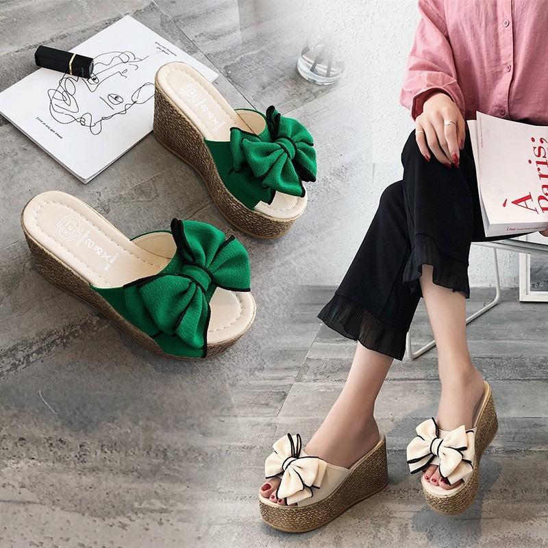 Slope heel sandals women's summer new bow one-word cool slippers women wear high-heeled beach slippers