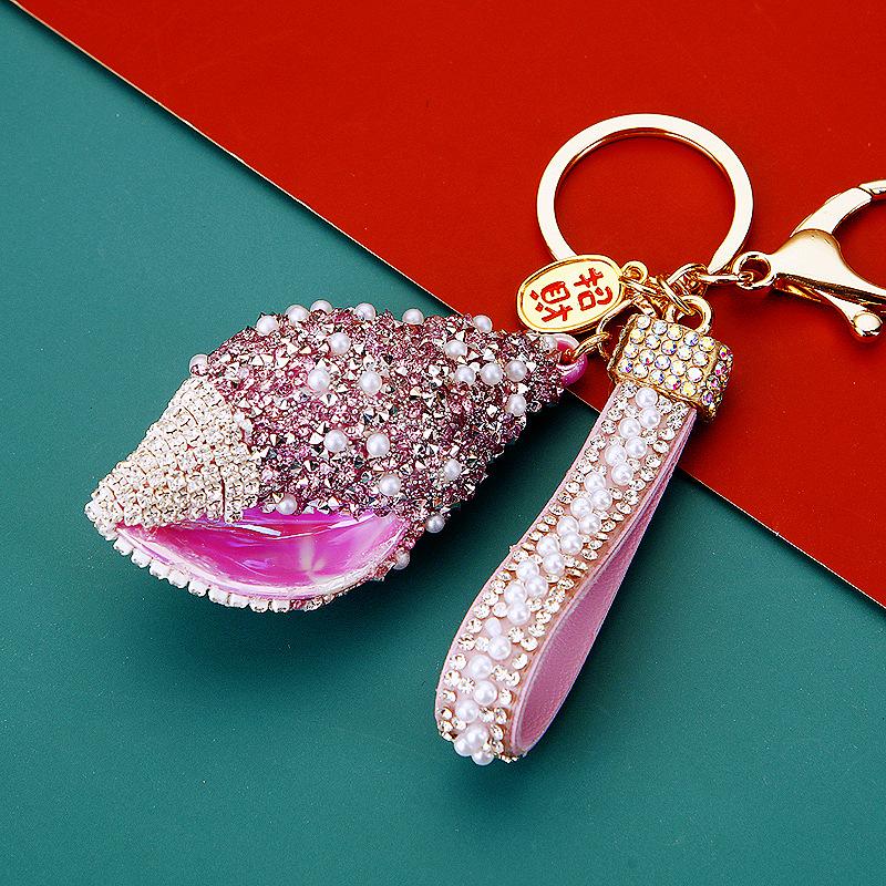 

Bling Blue Crystal Car Key Cover with Pearl Strap, Shiny Zircon Key Shell Protector, Luxury Zircon-Encrusted Key Cover with Wrist Strap individually packaged in opp bag