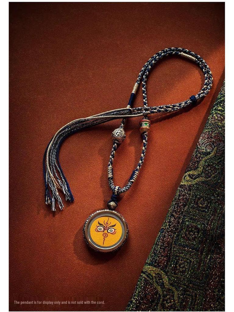 Tibetan Style Woven Thangka Pendant Necklace with Buddha Amulet and Six-Syllable Mantra.
