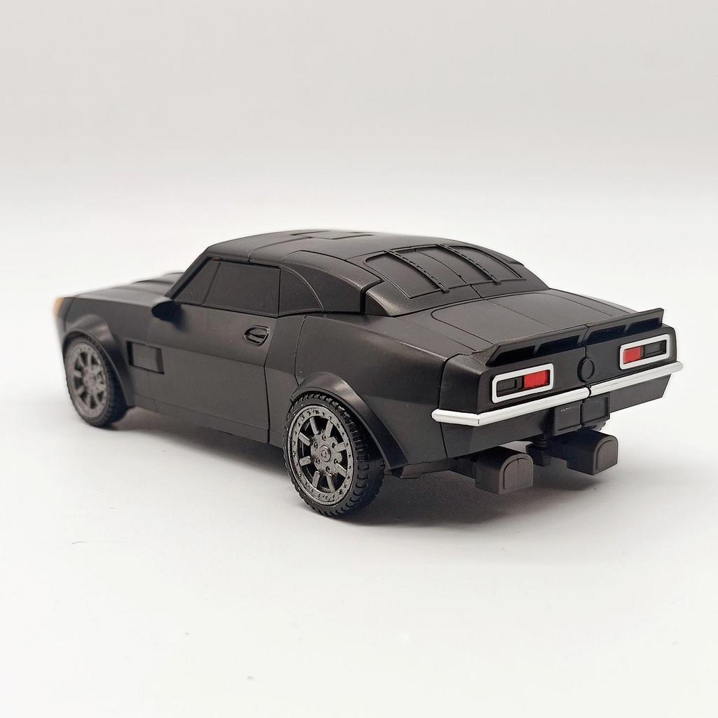Baiwei TW1038 Hidden Blade Deformation Toy: Black Yellowjacket Car Robot Movie Model 4 Figure