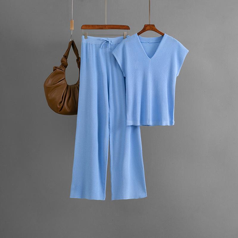 

Женский повседневный комплект из двух предметов: вязаный топ без рукавов с V-образным вырезом и модные брюки. OneSize синий