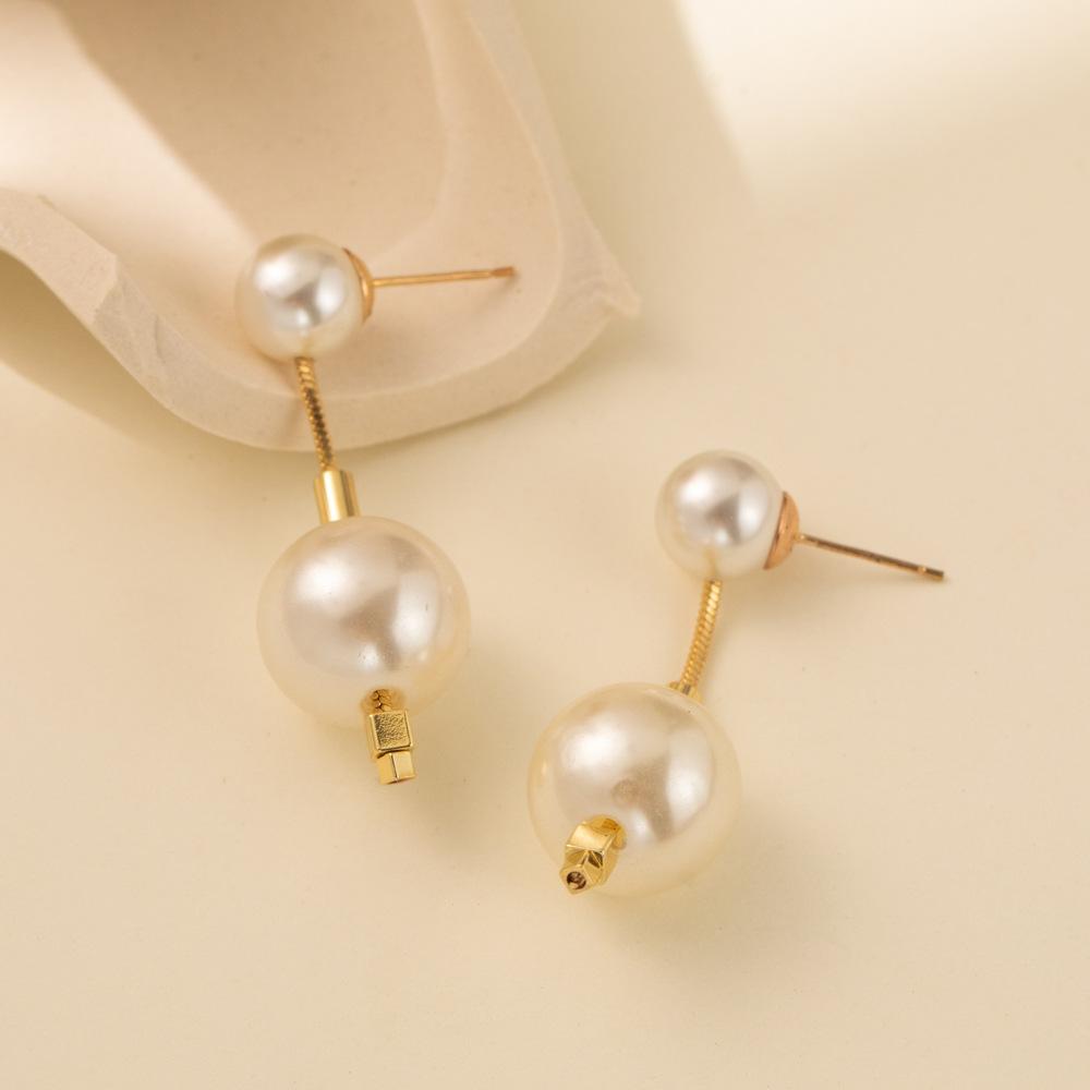 

Stylish Geometric Womens Faux Pearl Earrings With Gold Plated Design Chain