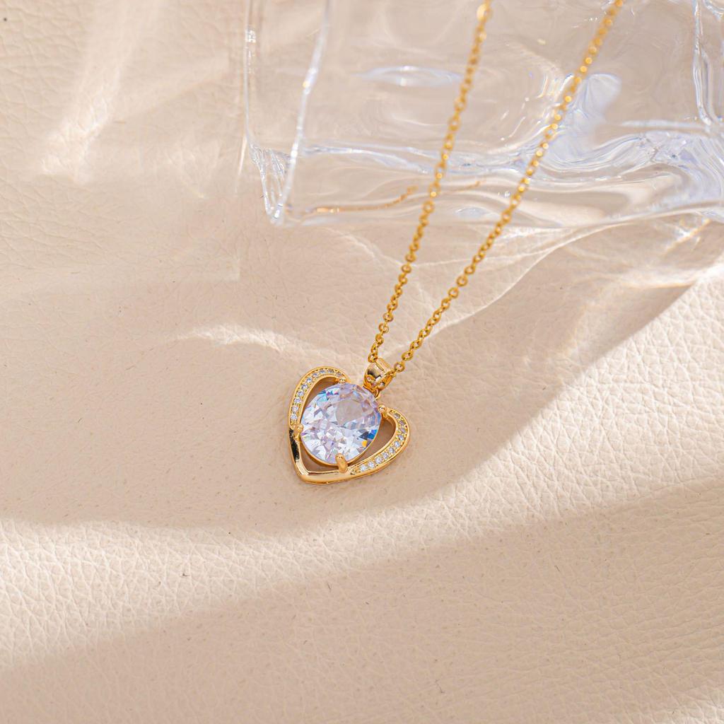 Simple Titanium Steel Necklace: European & American Style, Colorful Zircon Peach Heart Pendant, 14K Gold-Plated with Lasting Color.
