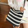 Striped woven bag women's 2025 new seaside super fire hollow tote bag large capacity fashion commuter messenger bag