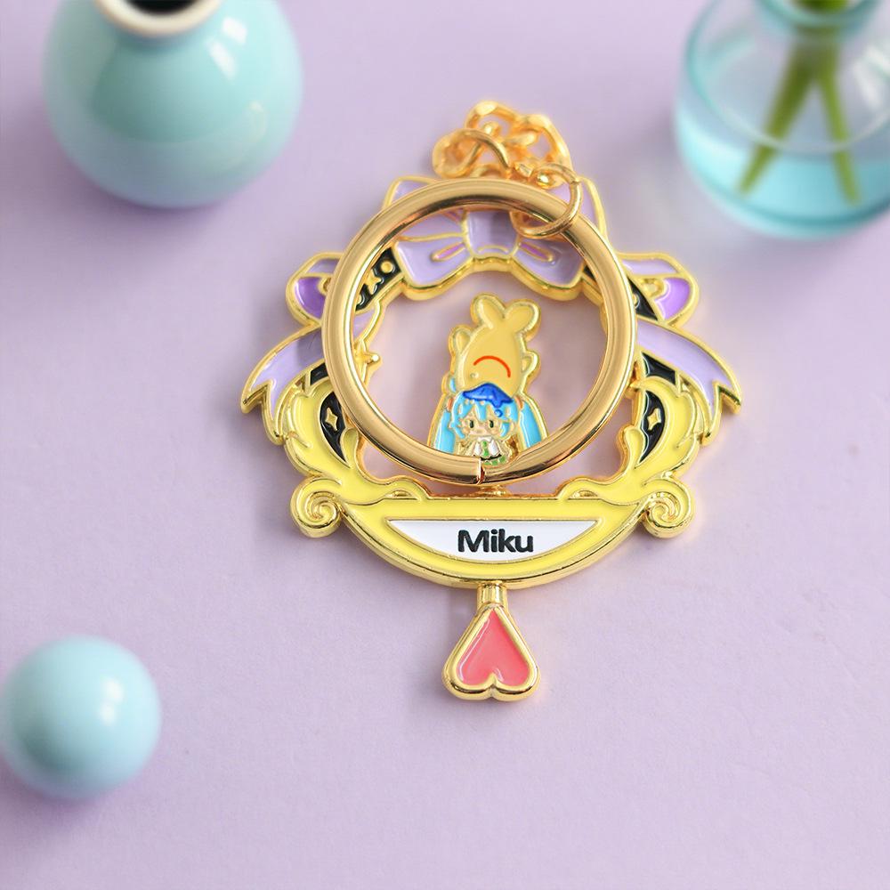 Rotating Enamel Keychain: Virtual Idol & Yellow Fish Robot Singer Pendant