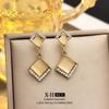 Elegant Cat's Eye Stone Earrings for Women with Floral Design Elements