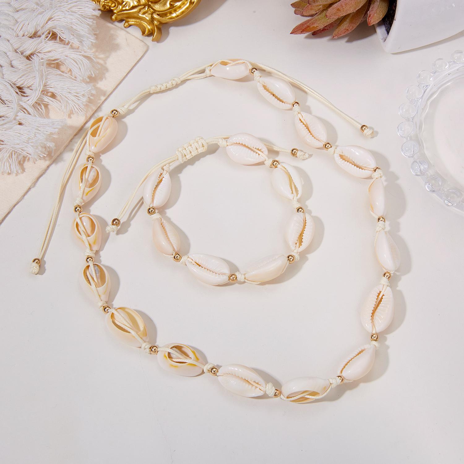 

Boho White Cowrie Shell Necklace & Bracelet Set for Women Handmade Beaded Rope Chain Choker Summer Beach Vacation Jewelry Gift