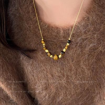 Autumn/Winter Tiger Eye Pendant Necklace: Women's Retro Long Sweater Chain, High-End Niche Accessory