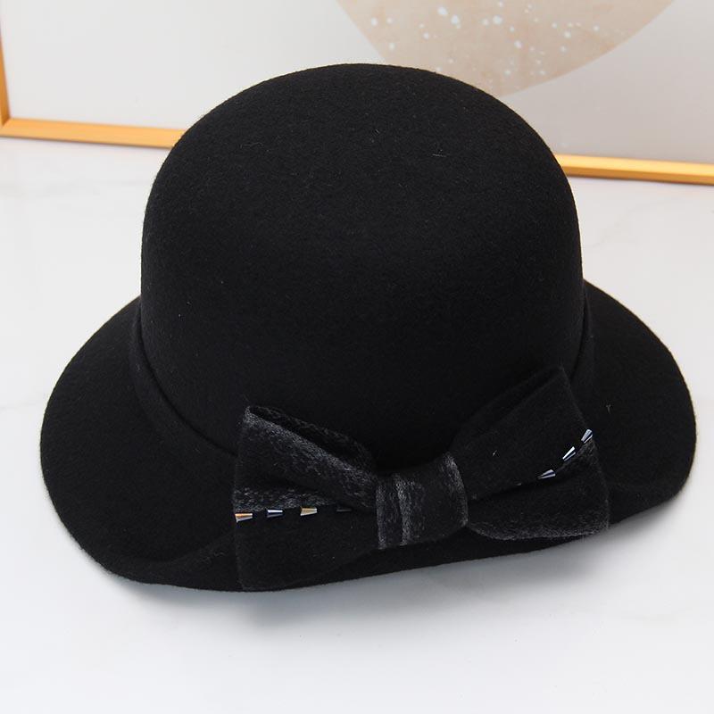 Autumn and winter hat women's thermal basin hat retro round top hat elegant bow fashion wool British fisherman hat