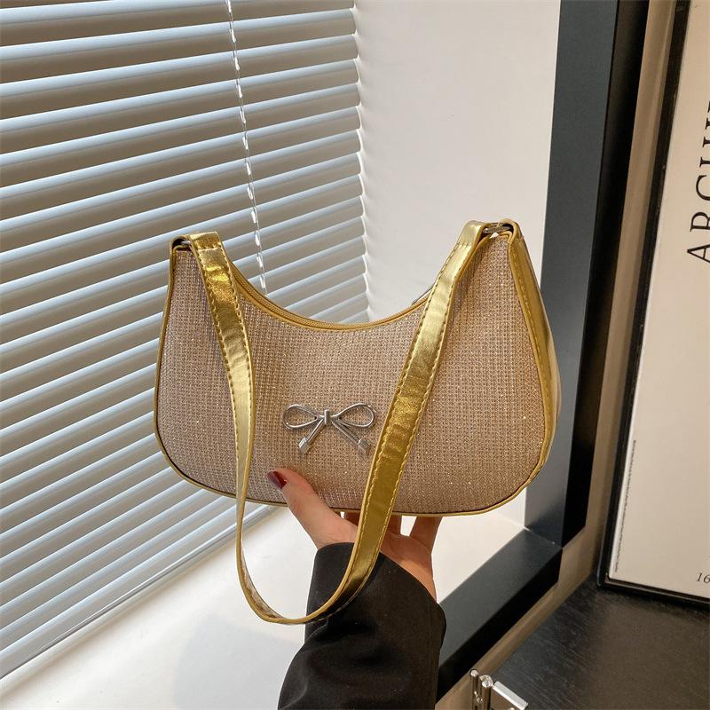 

Новые популярные сумки 2025 года, женская модная сумка на одно плечо под мышкой, нишевая дизайнерская сумка-пельмень под мышкой золотой