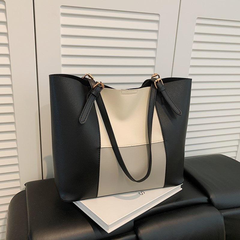 

Retro simple atmosphere commuting leisure summer new contrasting color large capacity shoulder portable tote bag сірий колір