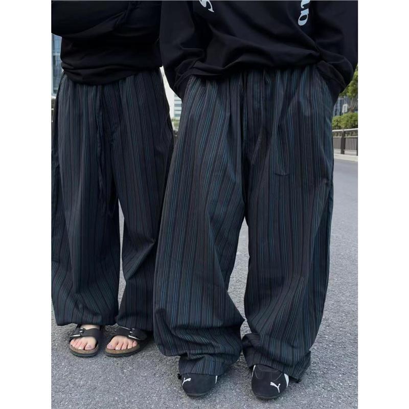 Amerikanische Retro-Schwarze und Blaue Vertikal gestreifte Säbel-Weitbeinige Hosen Herren und Damen Lässiges Lockeres Design Kann an den Füßen gebunden werden Bodenwischende Hosen