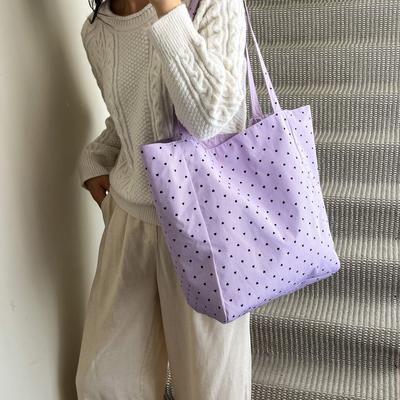 Sac fourre-tout pour femme 2025 été nouveau à la mode simple à une épaule design de niche couleur unie pois grande capacité sac sous le bras