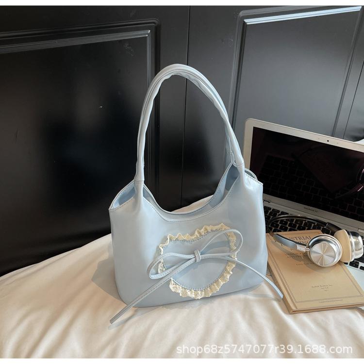 

Fashion texture underarm tote bag women s 2025 new foreign style love commuter bag large capacity commuter shoulder bag синий