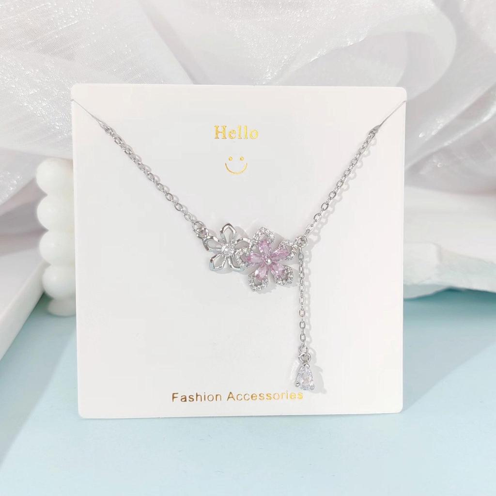 Pink Zircon Gourd Pendant Necklace with Floral Tassels - Titanium Steel Clavicle Chain for Women's Light Luxury.