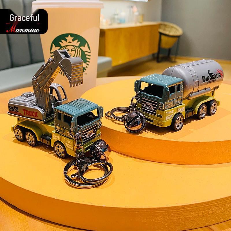 Portachiavi Creativo Veicolo da Costruzione Dinosauro - Ciondolo Auto Cartone Animato per Studenti e Coppie