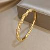1Luxurious Gold-colored Geometric Twisted Copper Bracelet with Gold-plated Charms, Fashionable Jewelry Suitable for Gifting To Friends and Family,