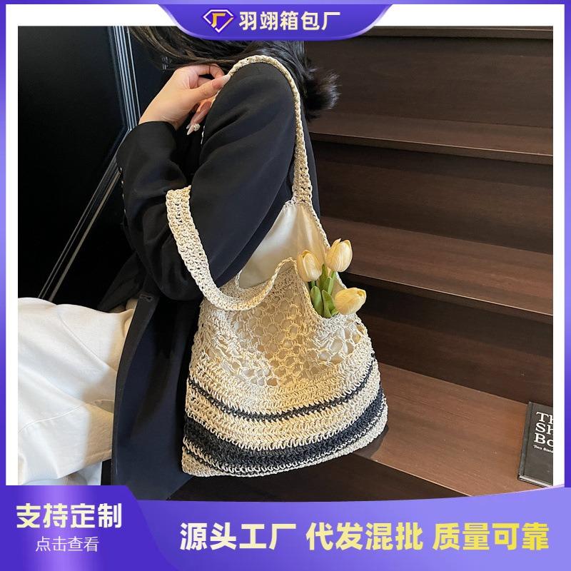 Handwoven large-capacity casual seaside vacation bag women's new fashion striped shoulder straw bag