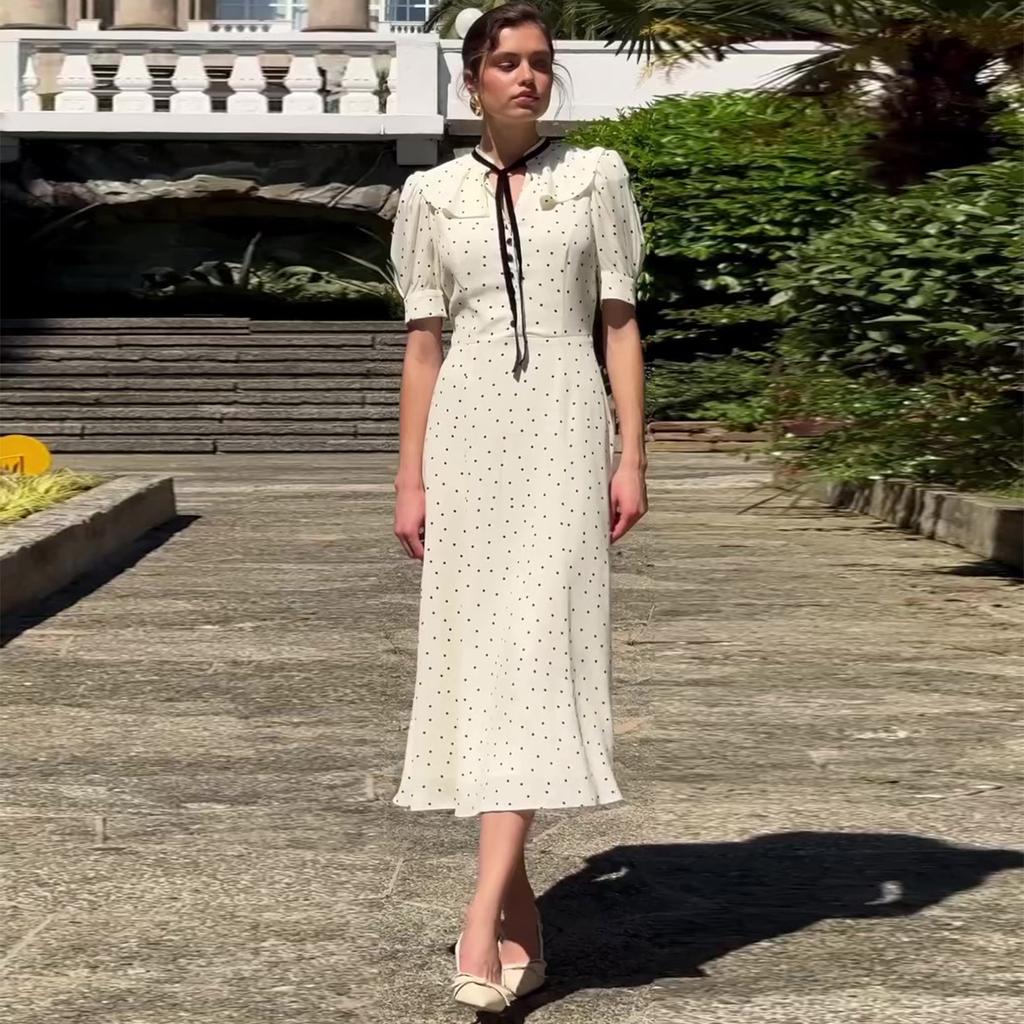 European and American women's clothing 2026 summer new French style lace-up lotus leaf collar bubble sleeve high waist polka dot dress