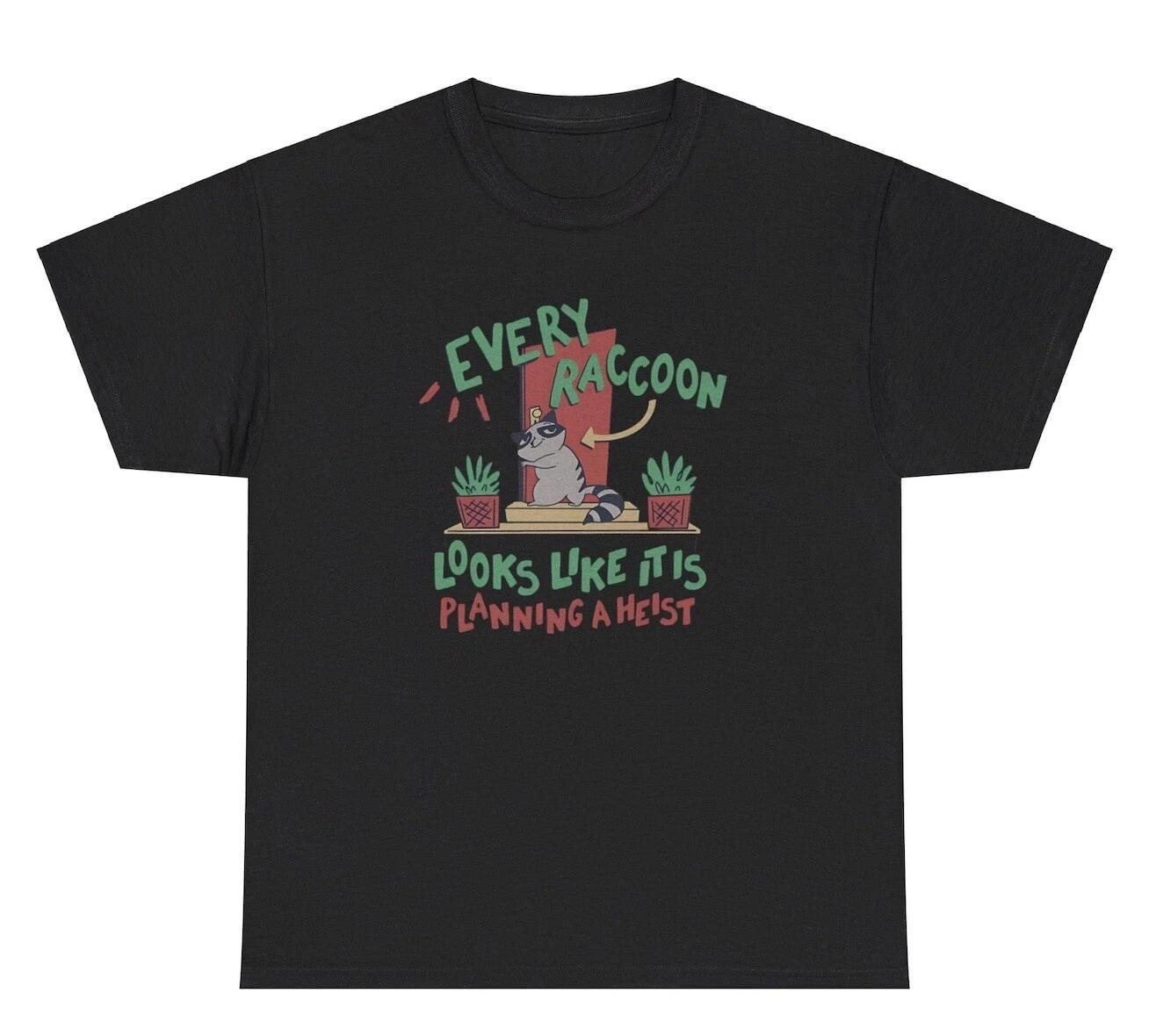 

Every Raccoon Looks Like It’s Planning A Heist T Shirt Funny Oddly Specific Tee 3XL