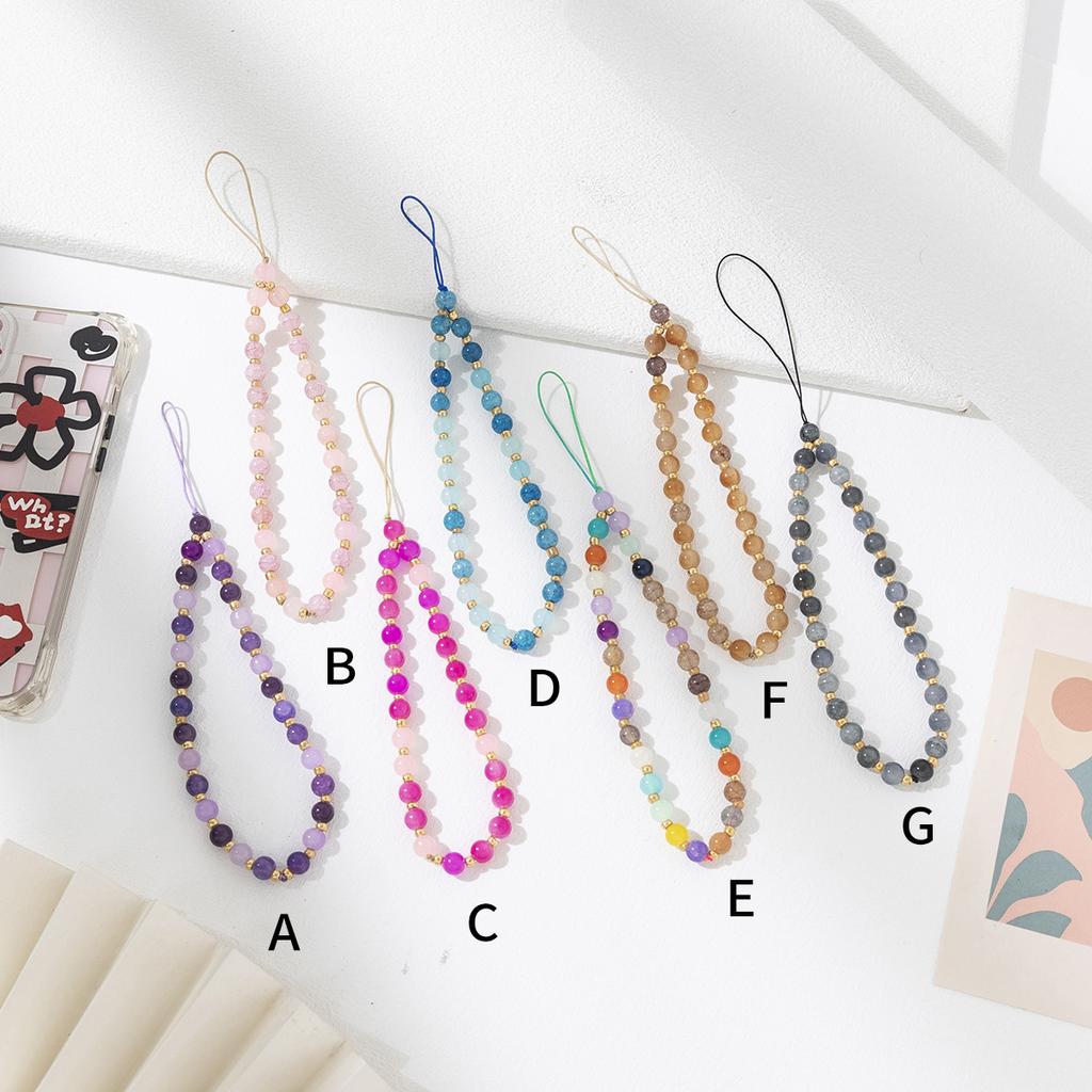 Color beaded series mobile phone chain fashionable women's short mobile phone anti-lost hanging chain pendant is in stock.