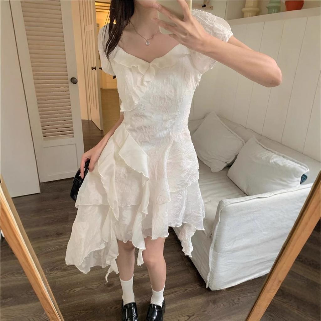 Coffee break French first love white irregular dress women's 2026 summer super fairy seaside vacation princess dress small man
