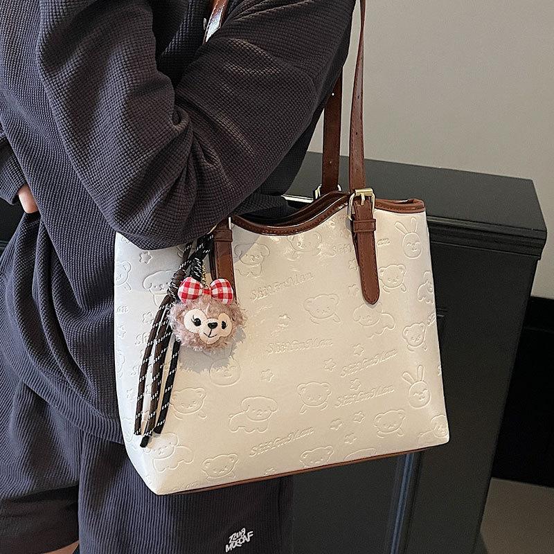 Spring and summer new casual Korean version cute embossed simple wind tote bag large capacity fashionable commuter shoulder women's bag