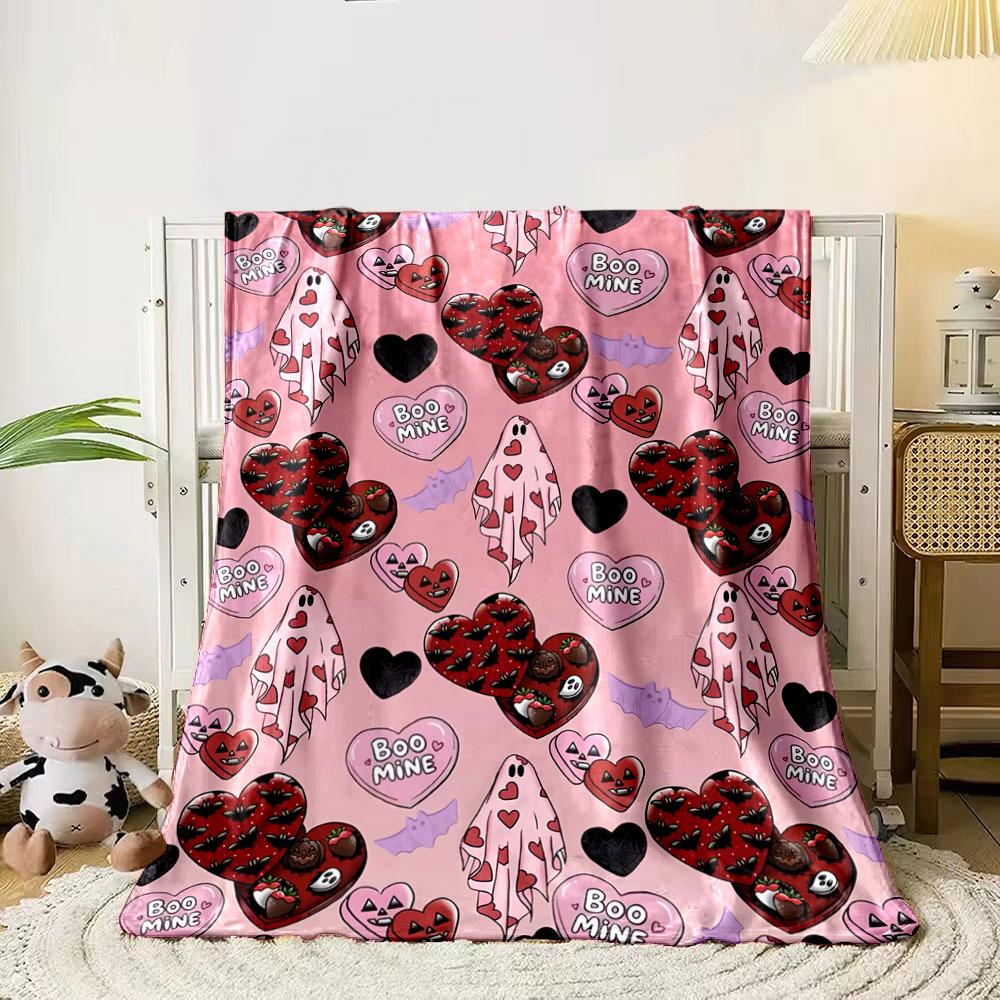 

Ghosts, heart boxes, bats, and Boo Mine on a pink background. for all seasons blanket lunch break throw gift 80cm x 120cm