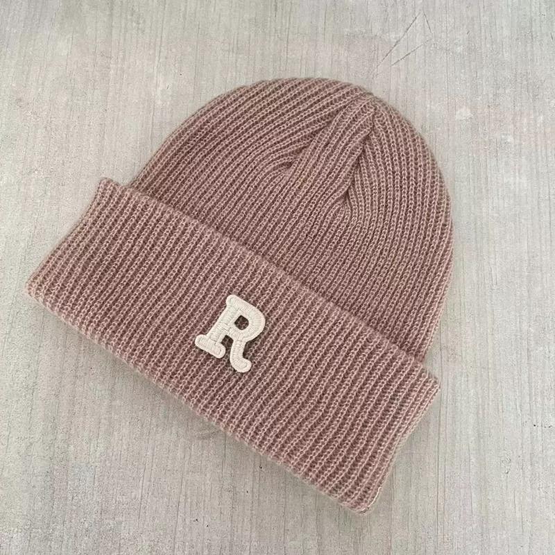 Hat winter female high-value round face student versatile cold-proof warm face small knitted wool hat