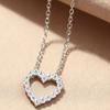 A Pendant Necklace for Women with a Rhinestone-embellished Hollow Heart Design for Valentine's Day