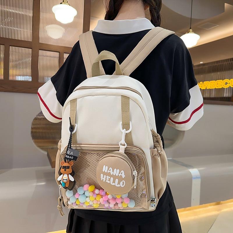 Lo stile universitario di alto valore è fresco, dolce e carino, zaino leggero per studenti delle scuole medie